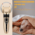 The electric pet hair trimmer and a dog fast asleep, showcasing the devices noise free design.